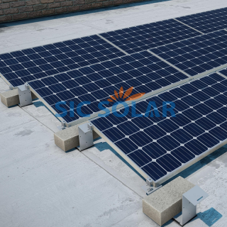 Ballasted solar PV roof mounting system